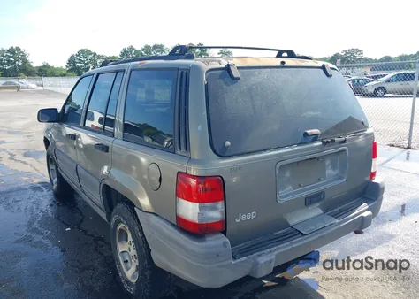 1997 Jeep Grand Cherokee Laredo/Tsi из США, поврежденный, VIN 1J4FX58S1VC514156